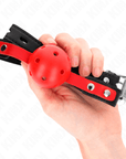 KINK - PALLA DURA CAVA ROSSA 4 CM GAG NERO CINTURINO 60 x 2 CM REGOLABILE 37 - 52 CM - KINK COLLAR & GAG - Intimo per le occasioni speciali | The Game Lingerie