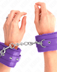 KINK - POGGIPOLSI PREMIUM IMBOTTITI IN PELLICCIA VIOLA CON CINTURA VIOLA REGOLABILE 17 - 29 CM X 6 CM - KINK WRIST RESTRAINT - Intimo per le occasioni speciali | The Game Lingerie