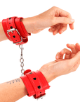 KINK - POLSO ROSSO CON INTARSIO A CUORE NERO REGOLABILE 21 - 28 CM X 5,5 CM - KINK WRIST RESTRAINT - Intimo per le occasioni speciali | The Game Lingerie