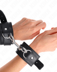 KINK - POTENZIALE DA POLSO FILA DI RIVETTI SINGOLA NERA REGOLABILE 17 - 28 CM X 5 CM - KINK WRIST RESTRAINT - Intimo per le occasioni speciali | The Game Lingerie
