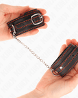 KINK - POTENZIALE DA POLSO PICCOLA NERA CON FODERA ROSSA REGOLABILE 14 - 24 CM X 3,5 CM - KINK WRIST RESTRAINT - Intimo per le occasioni speciali | The Game Lingerie