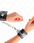 KINK - RESISTENZA DA POLSO CON CHIUSURA A LUCCHETTO NERO REGOLABILE 16 - 23 CM X 5,5 CM - KINK WRIST RESTRAINT - Intimo per le occasioni speciali | The Game Lingerie