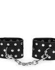 KINK - RESISTENZA DA POLSO CON CHIUSURA A SCATTO COMPLETA DI RIVETTI NERA REGOLABILE 19 - 24 CM X 5,5 CM - KINK WRIST RESTRAINT - Intimo per le occasioni speciali | The Game Lingerie