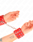 KINK - RESISTENZA DA POLSO CON CHIUSURA A SCATTO COMPLETA DI RIVETTI ROSSO REGOLABILE 19 - 24 CM X 5,5 CM - KINK WRIST RESTRAINT - Intimo per le occasioni speciali | The Game Lingerie