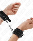 KINK - RESISTENZA DA POLSO CON MOTIVO SERPENTE NERO REGOLABILE 20 - 28 CM X 5,4 CM - KINK WRIST RESTRAINT - Intimo per le occasioni speciali | The Game Lingerie