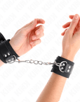 KINK - RESISTENZA DA POLSO IN NYLON NERO CON CINTURA IN PELLE NERA REGOLABILE 19 - 29 CM X 5,1 CM - KINK WRIST RESTRAINT - Intimo per le occasioni speciali | The Game Lingerie