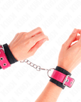 KINK - RESISTENZA DA POLSO IN NYLON NERO CON CINTURA IN SIMILPELLE ROSA LAMPONE REGOLABILE 19 - 29 CM X 5,1 CM - KINK WRIST RESTRAINT - Intimo per le occasioni speciali | The Game Lingerie