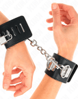 KINK - RESISTENZA DA POLSO MULTIPOSIZIONE CON CHIUSURA A LUCCHETTO NERA REGOLABILE 16 - 23 CM X 5,5 CM - KINK WRIST RESTRAINT - Intimo per le occasioni speciali | The Game Lingerie