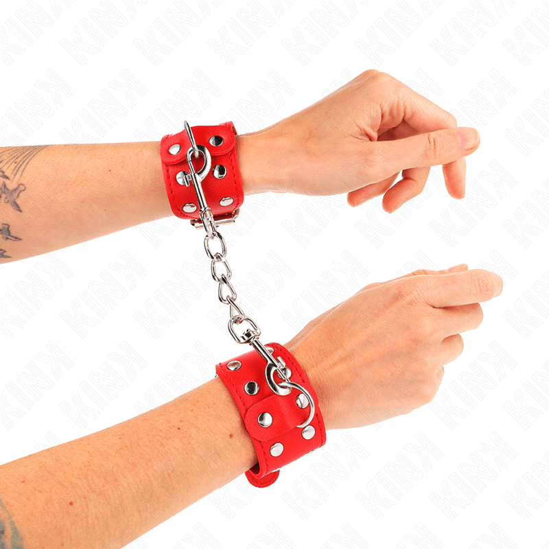 KINK - BRACCIALI CON DOPPIA LINEA DI BORCHIE REGOLABILI ROSSO - KINK WRIST RESTRAINT - Intimo per le occasioni speciali | The Game Lingerie