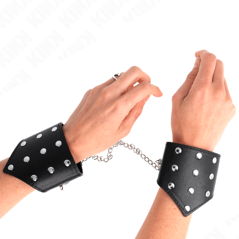 KINK - BRACCIALI STILE PUNTO NERO CON CATENA REGOLABILE 17 - 23 CM X 8,5 CM - KINK WRIST RESTRAINT - Intimo per le occasioni speciali | The Game Lingerie