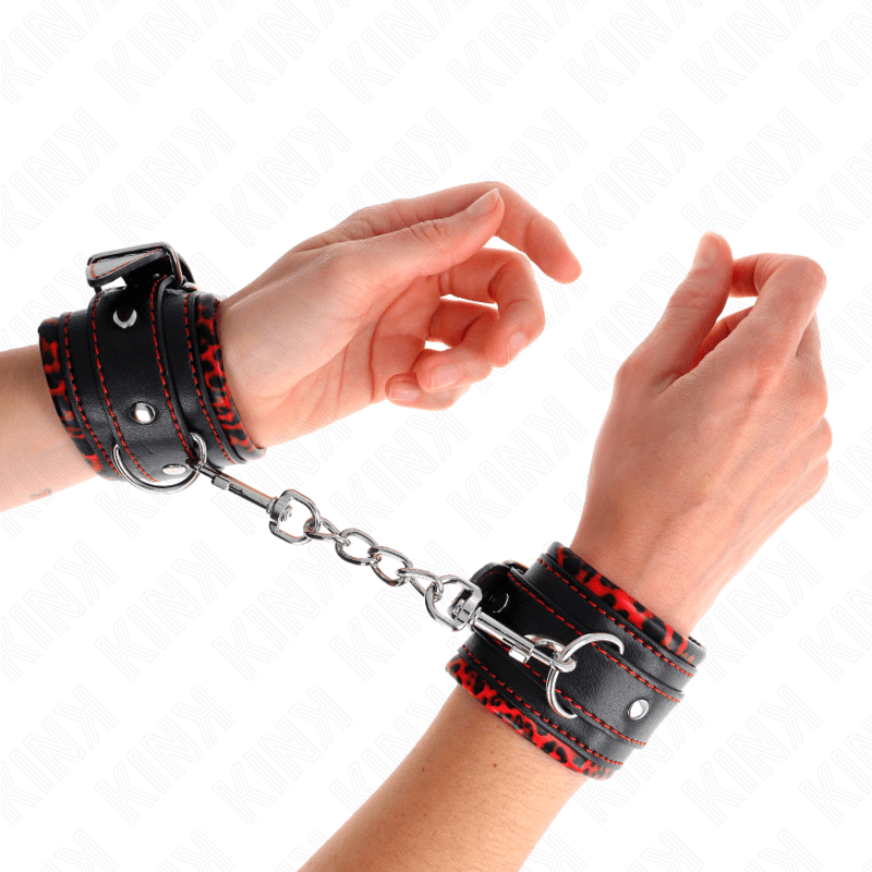 KINK - POGGIPOLSI IMBOTTITI IN PELLICCIA ROSSO/NERO REGOLABILE 17 - 29 CM X 6 CM - KINK WRIST RESTRAINT - Intimo per le occasioni speciali | The Game Lingerie