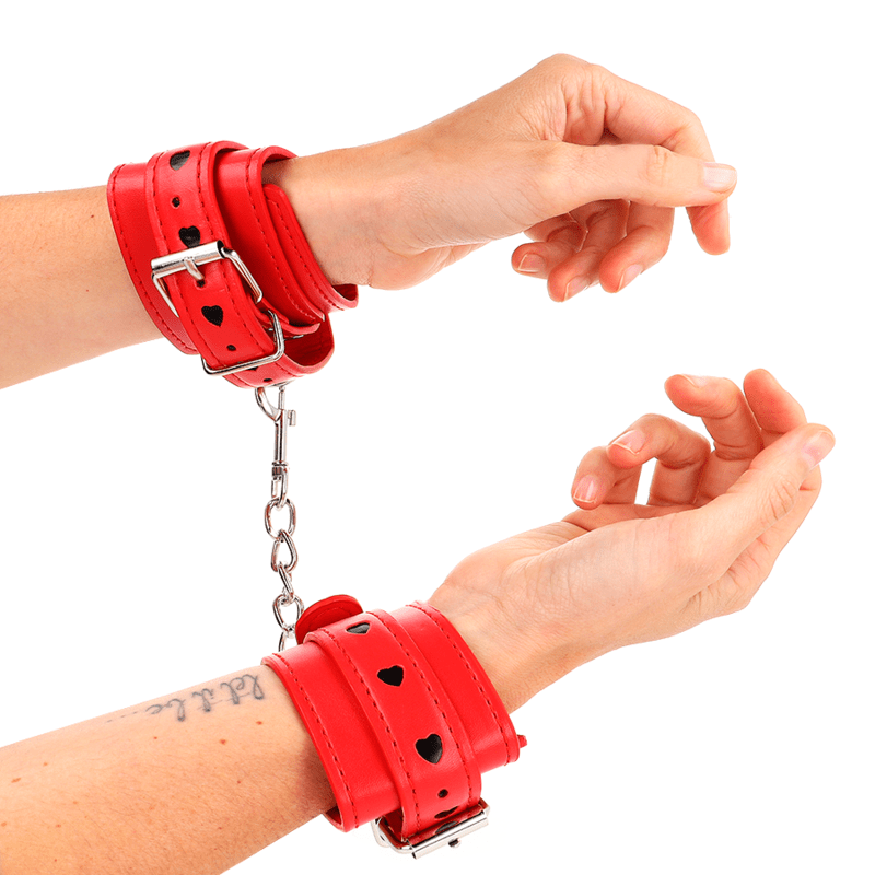 KINK - POLSO ROSSO CON INTARSIO A CUORE NERO REGOLABILE 21 - 28 CM X 5,5 CM - KINK WRIST RESTRAINT - Intimo per le occasioni speciali | The Game Lingerie