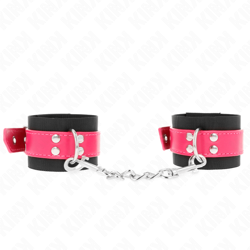 KINK - RESISTENZA DA POLSO IN NYLON NERO CON CINTURA IN SIMILPELLE ROSA LAMPONE REGOLABILE 19 - 29 CM X 5,1 CM - KINK WRIST RESTRAINT - Intimo per le occasioni speciali | The Game Lingerie